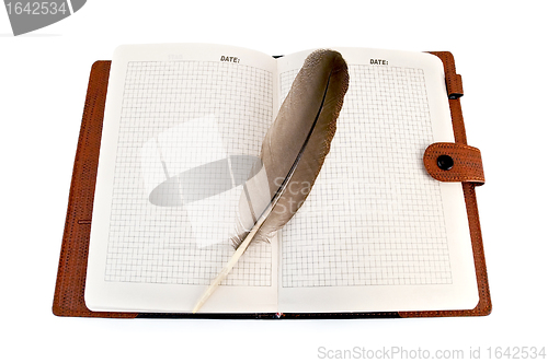 Image of Notebook with quill