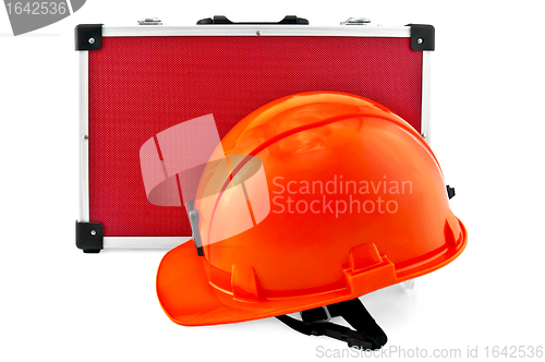 Image of Orange helmet and red suitcase