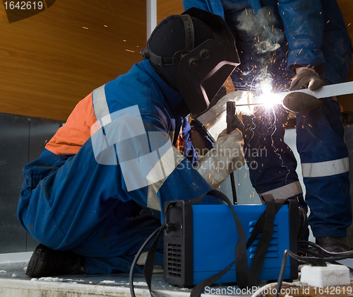 Image of Welder working with a metal structure