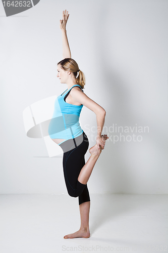 Image of Pregnant woman stretching