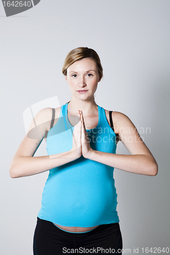 Image of Pregnant woman meditating