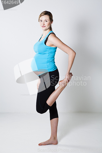 Image of Pregnant woman stretching