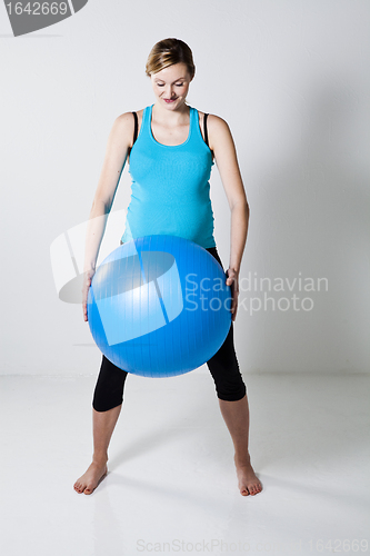 Image of Pregnant woman with fitness ball