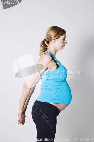 Image of Pregnant woman stretching