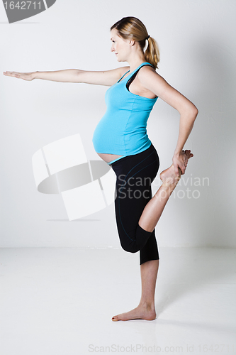 Image of Pregnant woman stretching