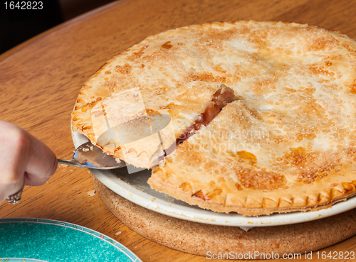 Image of Home made apple and strawberry pie served