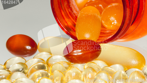 Image of Macro of fish oil capsules in RX bottle