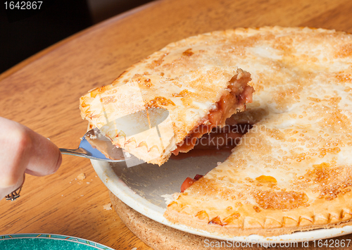 Image of Home made apple and strawberry pie served