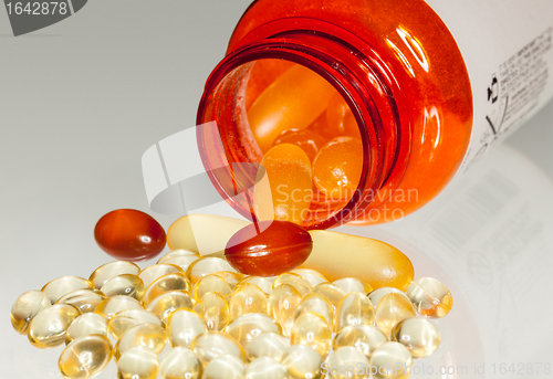 Image of Macro of fish oil capsules in RX bottle