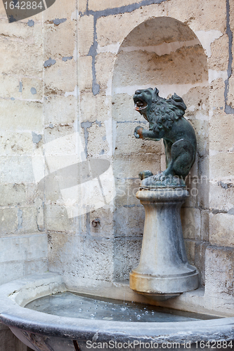 Image of Lion drinking fountain in wall of Town Hall