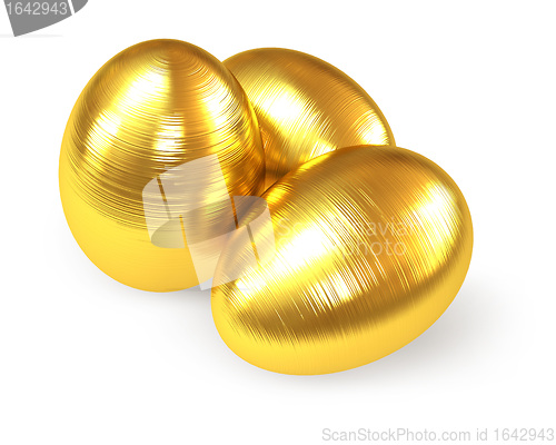 Image of Golden fluted eggs isolated on white background.