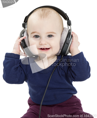 Image of toddler with earphones