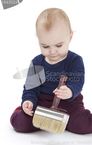 Image of young child with brush