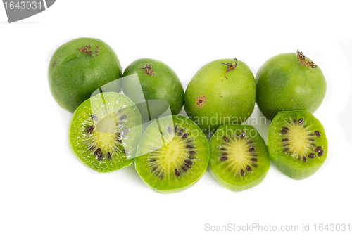 Image of couple of kiwi berries on white