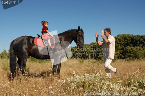 Image of child on horse