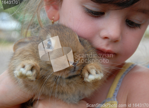 Image of little girl and bunny