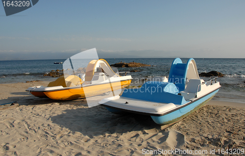 Image of blue and yellow pedalos