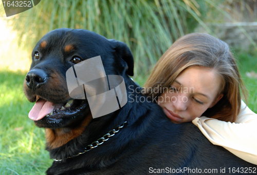 Image of girl and rottweiler