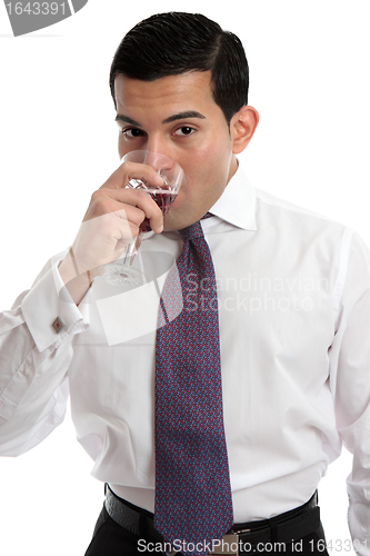 Image of Man tasting drinking sparkling wine