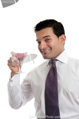 Image of Man raising a glass of wine