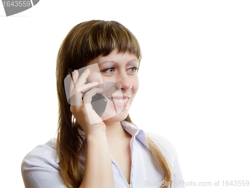 Image of young woman talking on a cell phone