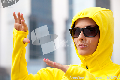 Image of girl in a black sunglasses