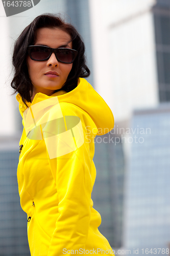 Image of brunette in sunglasses