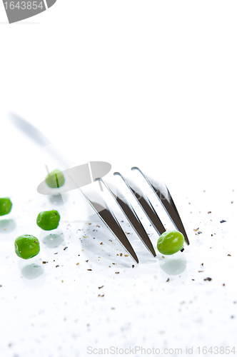 Image of Close-up of fork and peas