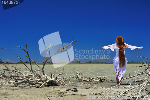 Image of Beautiful girl with waving hair 