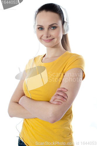 Image of Young girl listening to music