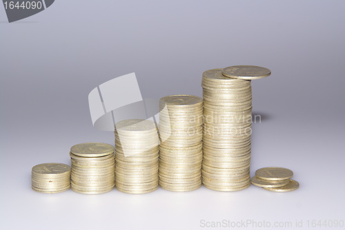 Image of Rising pyramid of coins