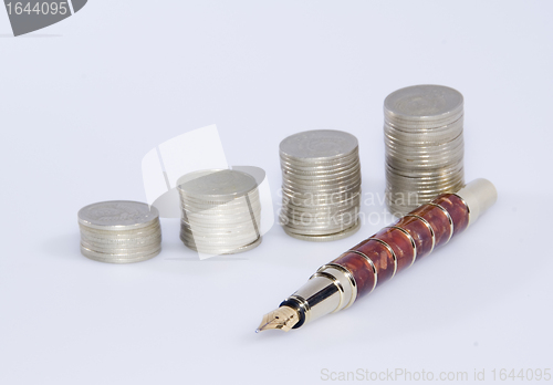 Image of Rising piles of coins