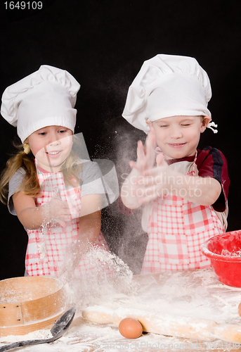 Image of two cooks