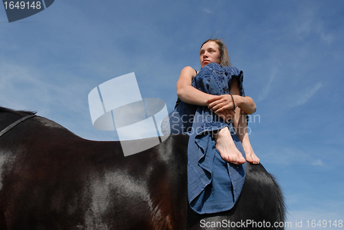 Image of sad riding girl