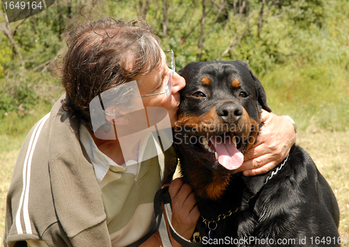 Image of man and rottweiler