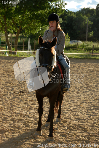 Image of horse and woman in dressage