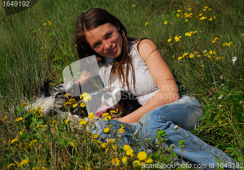 Image of girl and little dog