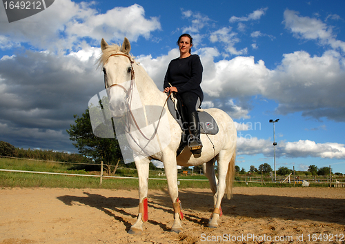 Image of horse and woman in dressage