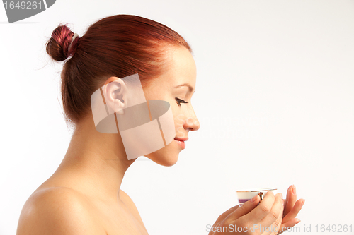 Image of naked girl with coffee cup