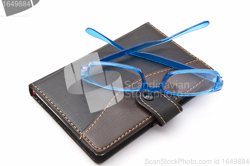 Image of Notebook and Glasses