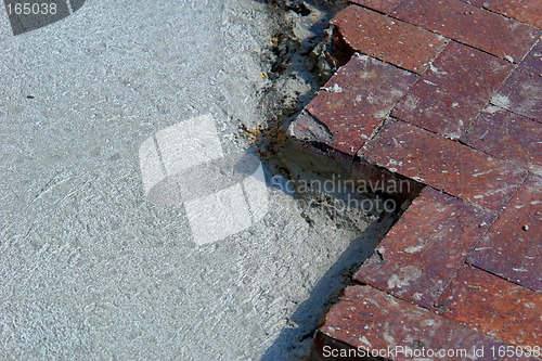 Image of Half brick and cement background