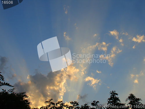 Image of Sun rays through clouds