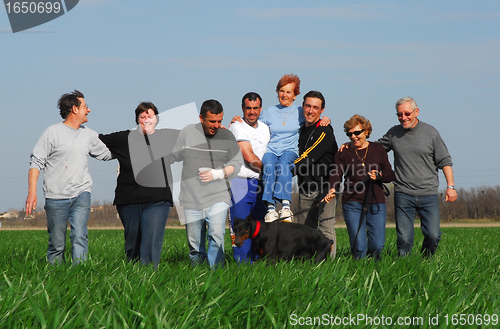 Image of people and dog