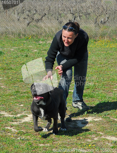 Image of woman and italian mastiff