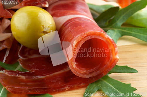 Image of Slices of jamon and olives