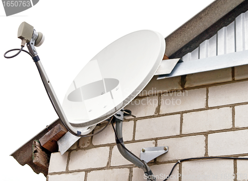 Image of Satellite dish antenna on house