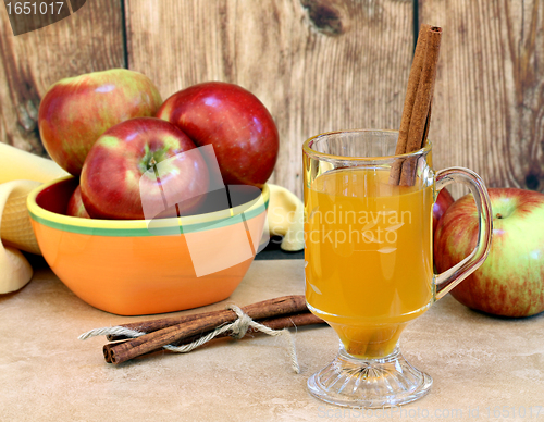 Image of Apple cider with cinnamon sticks