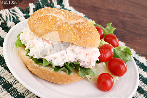Image of Seafood Salad Sandwich on a hard roll.