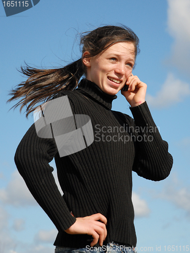 Image of teenager and phone