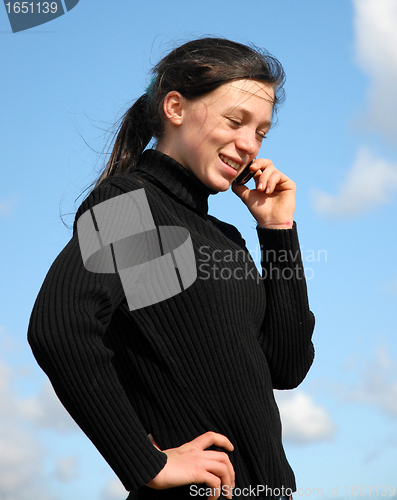 Image of teenager and phone